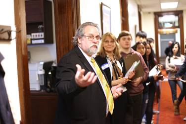 Rep. Guttenberg chatting with Juneau students touring the capital.
