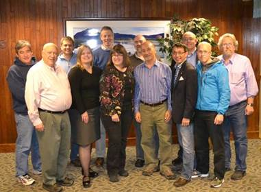 From left to right: Democratic Caucus members Sam Kito III, Max Gruenberg, Chris Tuck, Geran Tarr, Matt Claman, Harriet Drummond, Adam Wool, Les Gara, Scott Kawasaki, Andy Josephsen, Jonathan Kreiss-Thompkins and David Guttenberg.