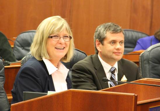 Representative Kerttula and Representative Tuck on the House Floor on the first day of session, 2014.