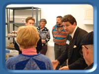 Rep. Croft speaking to a group at Kids' Kitchen