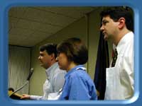 Sen. Ellis, with Rep. Guess and Rep. Croft, speaks during the presentation.