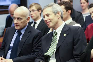 Rep. Ortiz and I listen during a meeting of the Independent-Democratic Caucus 