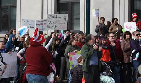 People rally to support early education funding on the Capitol steps! 