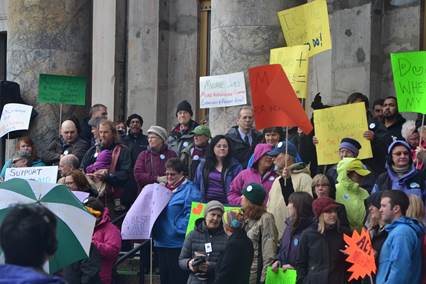 Advocates of Medicaid expansion rally on the Capitol steps last week.