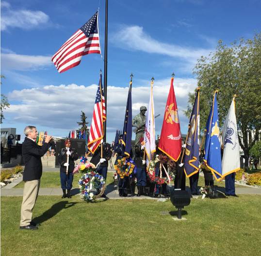 Rep. Claman practicing Echo Taps at the Memorial Day Ceremony on the Delaney Park Strip.