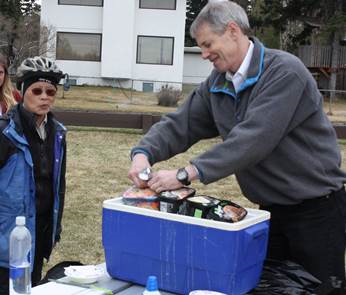 Matt serves up some ice cream for a constituent who biked to our Ice Cream in the Park event!