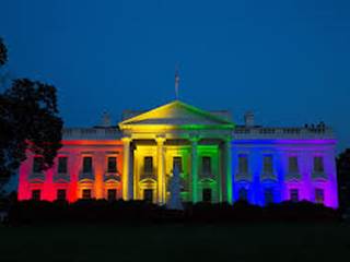 President Obama shines lights at the White House to reflect the Supreme Court’s decision regarding same-sex couples.