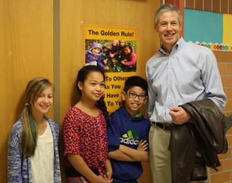 Fourth graders at Lake Hood Elementary give a tour of the school to Rep. Claman.