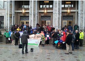 Key Coalition members rallying on the steps of the Capitol 