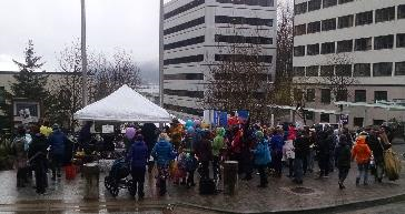 Parents and teachers gathering at the Capitol to protest excessive cuts