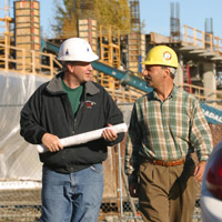 Rep. Les Gara during a meeting at a construction site