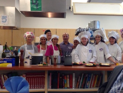 Rep. Gara with East High's culinary students