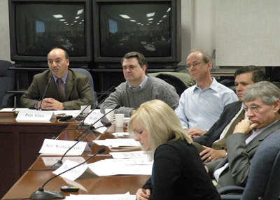 Rep. Gara and Amanda Metivier taking in information about foster care with Senators Ellis, French, Wielechowski, and Rep. Petersen.