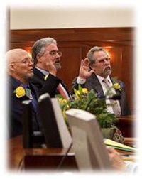 Rep Dick (Dist 6), Rep Miller (Dist 7) and Rep Guttenberg are sworn in on the first day of session