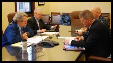 Rep David Guttenberg chairing the Alaska Arctic Policy teleconference along with Rep Bob Herron (D-Bethel), Navy Lt. Commander Rich Halbig, and Jamie Robinson from US Coast Guard Arctic Coordination. 