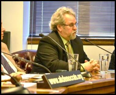 Rep. Guttenberg speaking at a press event