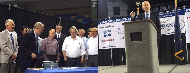 Rep Guttenberg and Governor Walker take part in signing HB 105.