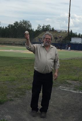 Rep. Guttenberg preparing to pitch at the Goldpanners game.