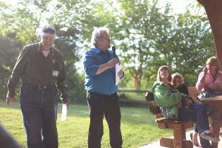Rep. Guttenberg and Ron Illingworth speaking at the annual Peony Tour.