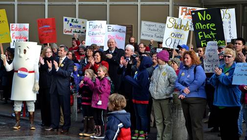 Public school supporters at the education rally ? check out a Youtube clip of one of their chants here