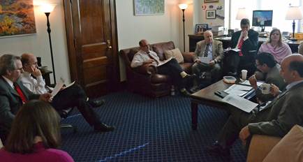 The minority caucus in discussion before House Floor session
