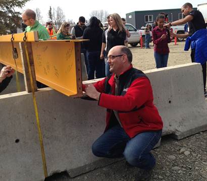 I signed the final beam before it was put in to place at the new UAA Sports Arena 