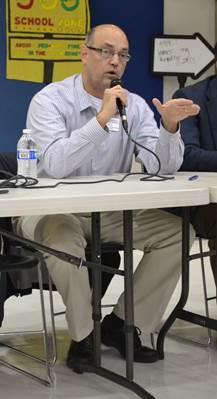 Talking with neighbors at last month?s Town Hall meeting on the Northern Access Road