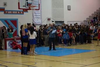 Presenting the East High Softball team with a citation commemorating their State Championship victory in 2013.