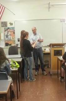 Presenting citations to the East High students that helped write them.