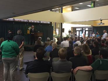 President Johnsen speaking at the University