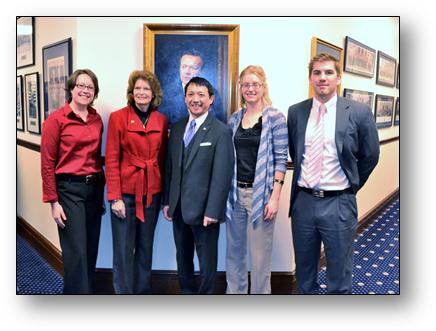 Rep. Kawasaki and staff, Mindy O'Neall, Jessie Peterson, and Tyler Spaan, with U.S. Senator Lisa Murkowski before her annual address to the Alaska Legislature. Behind is the newly unveiled portrait of the late Senator Ted Stevens.