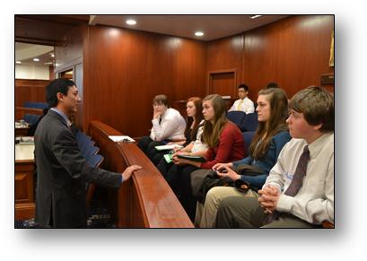 Rep. Kawasaki discusses the negative effects of GMO Fish with bright, young members of AYEA during their recent visit to the Capitol.