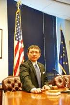Rep. Scott Kawasaki at committee chair with gavel