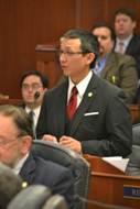 Rep. Kawasaki speaking on the floor of the House of Representatives
