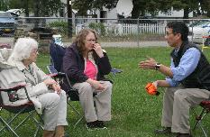 In discussion with neighbors