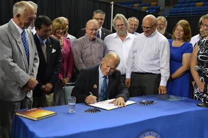 Governor Walker signing the Interior Energy Project bill in July.