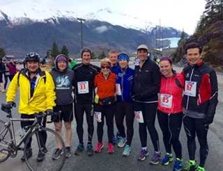 Enjoying Juneau’s (pre-) April showers at the Glacier 10K. Bucking the trend, Rep. Kito rode his bike.