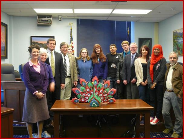 Sam, along with Rep. Chris Tuck and Sen. Dennis Egan, were presented with a Peacock for Peace crafted by a Thunder Mountain High School art class and U.S. State Department Youth Exchange and Study Program students containing over 2000 pieces of origami.