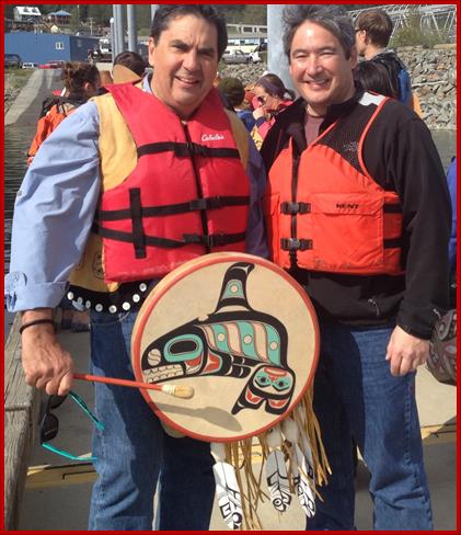 Sam with Carlton Smith getting ready to paddle in a canoe with the One People Canoe Society from Douglas Harbor to Marine Park for the Maritime Festival.