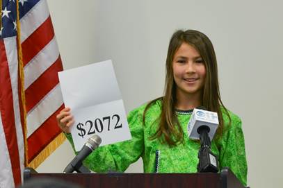 September 21: Shania Sommer, a 7th-grade student at Palmer Junior Middle School, announced the 2015 PFD amount. 