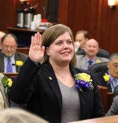 Rep. Geran Tarr being sworn into the Alaska House of Representatives on the first day of session.