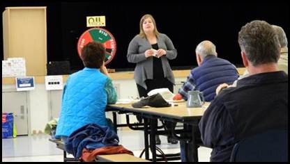 Rep. Tarr discussing the budget with neighbors.