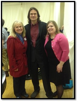 Pictured: First Lady Walker, David Holthouse, and Rep. Tarr standing together against domestic violence at the One Billion Rising event 