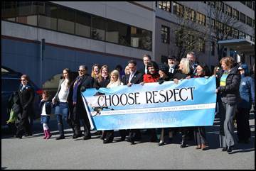 Rep. Tarr & Erin holding the sign for Gov. Parnell’s Choose Respect March in Juneau on March 27.