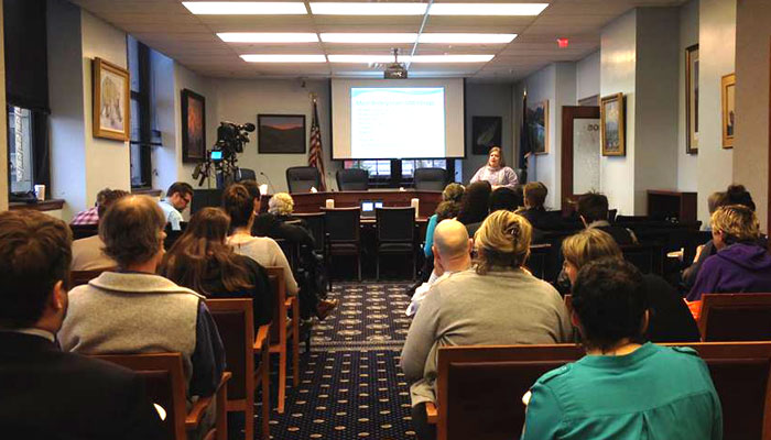 Representative Tarr speaks to a large crowd at the  Juneau-based discussion on GMOs.  Attendees had many questions and wanted to know what products are most commonly genetically modified.  The answer: soy, corn, canola, sugar beets, and cotton.
