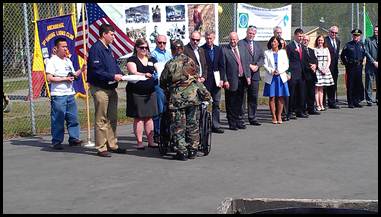 Rep. Tarr presents citations for Hmong Veterans of the Vietnam War to the veterans and their families.