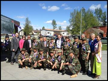  Rep. Tarr, Senator Ellis, U.S. Senator Mark Begich, and Assemblyman Pete Petersen with Hmong Veterans being honored for their service outside of the Mountain View Boys & Girls Club.