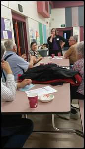 Rep. Tarr at Wonder Park Elementary, listening to a constituent concern.