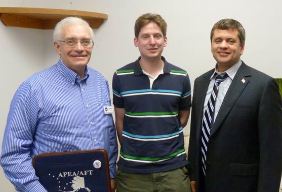 Rep. Tuck receives a visit in his Juneau office from Duane Moran (left) and constituent Greg Collen to discuss education issues.