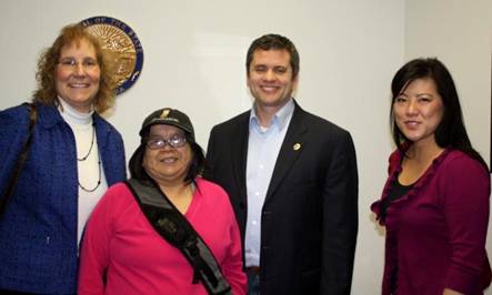 Constituent Anna Attla joins Teresa Holt and Julie Broyles in talking with Rep. Chris Tuck about support for people with disabilities.